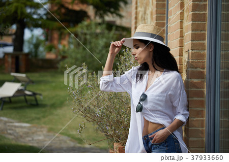 Beautiful woman resting in the summer the Italian garden 37933660