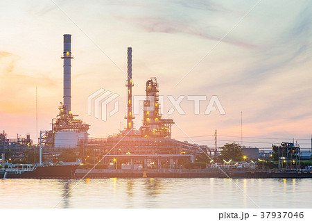 Oil factory water side with sunset tone Oil factory water side with sunset tone 37937046
