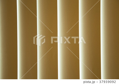 Beautiful soft yellow curtain background. 37939092