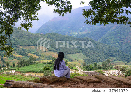 A woman looking at mountains 37941379