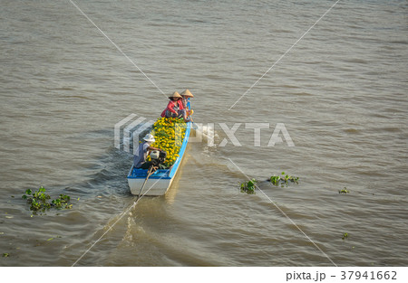 Wooden boat on Mekong River in Vietnam Wooden boat on Mekong River in Vietnam 37941662