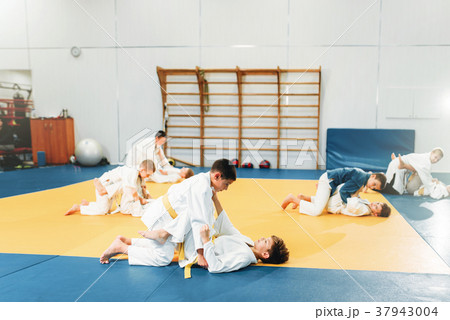 Kid judo, children on fight training, martial art Kid judo, children on fight training, martial art 37943004
