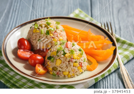 Pearl barley porridge with vegetables. Pearl barley porridge with vegetables. 37945453