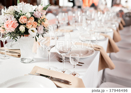 Tables set for an event party or wedding reception Tables set for an event party or wedding reception 37946496