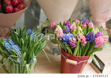 Flower shop concept. Different varieties fresh Flower shop concept. Different varieties fresh 37946515