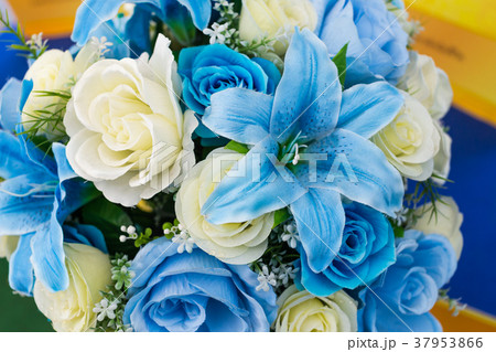 The colorful plastic flower 37953866