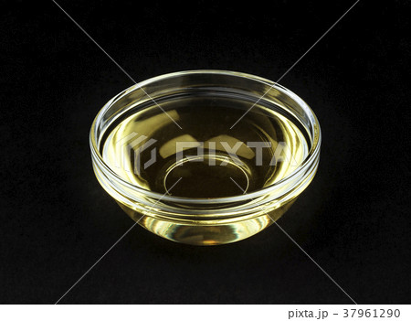 Vinegar in bowl isolated on black background Vinegar in bowl isolated on black background 37961290