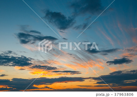 clouds with evening sunset in the background 37963806