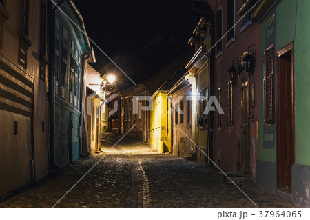 Night view of historic town Sighisoara 37964065