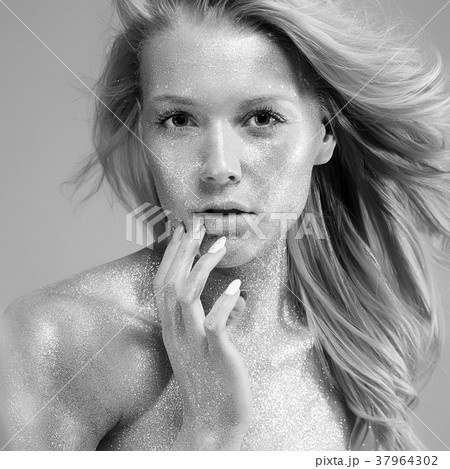 Portrait of Beautiful Woman with Sparkles 37964302