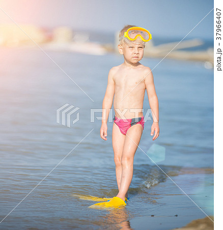 Cute little kid wearing mask and flippers for Cute little kid wearing mask and flippers for 37966407