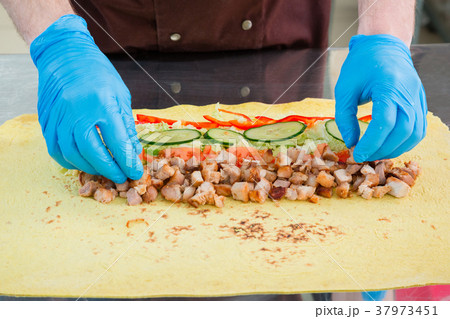 Cooking shawarma. Cooking shawarma. 37973451