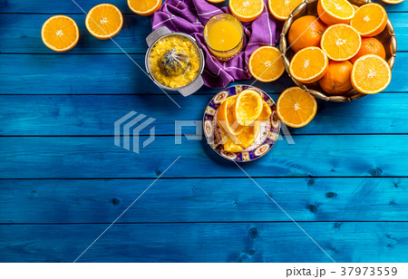 Hand juicer and fresh oranges.Tropical fresh fruit 37973559