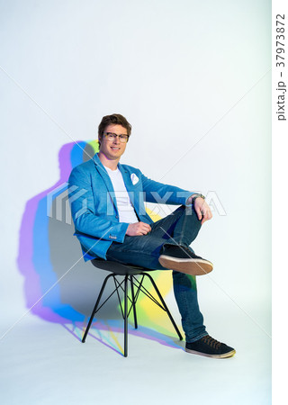 Happy male locating on seat 37973872