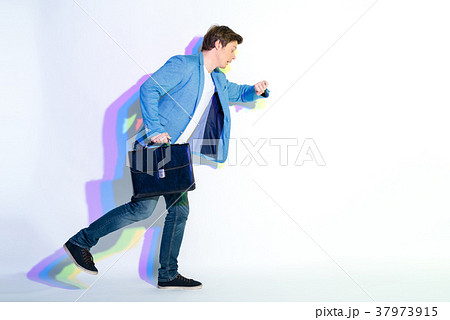 Amazed male looking at watch Amazed male looking at watch 37973915