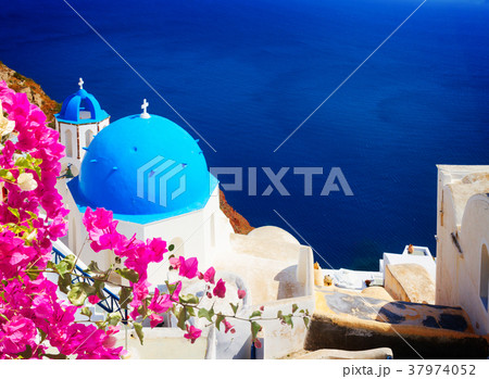 traditional blue dome with  sea, Santorini 37974052
