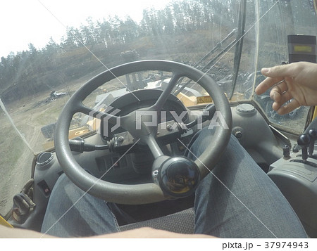 Tractor interior inside during working process 37974943