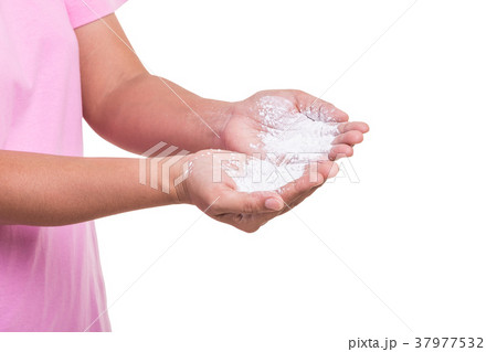 Ovarian cancer concept. Woman holding white powder isolated on white. Powder is cause of ovarian cancer. Saved with clipping path 37977532