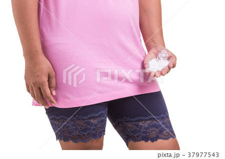 Ovarian cancer concept. Woman holding white powder isolated on white. Powder is cause of ovarian cancer. Saved with clipping path Ovarian cancer concept. Woman holding white powder isolated on white. Powder is cause of ovarian cancer. Saved with clipping path 37977543