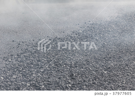 Process of building new asphalt road on the new road construction site in Thailand 37977605