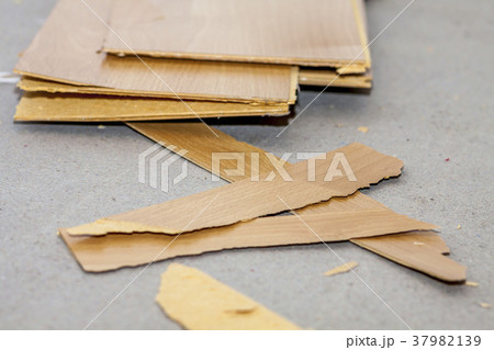 Room full of removed laminate lying on floor Room full of removed laminate lying on floor 37982139