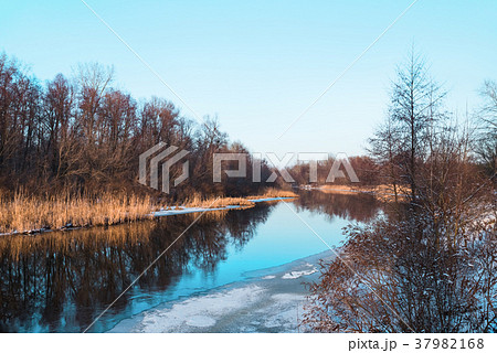 river quietly flowing flows through the forest 37982168