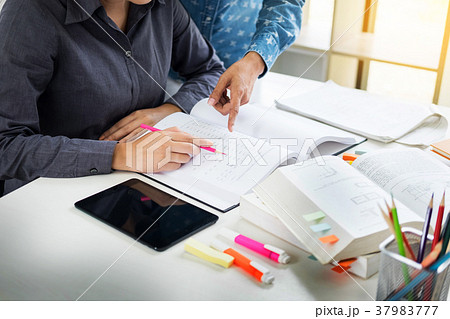 Young students campus helps friend catching up and learning tuto 37983777