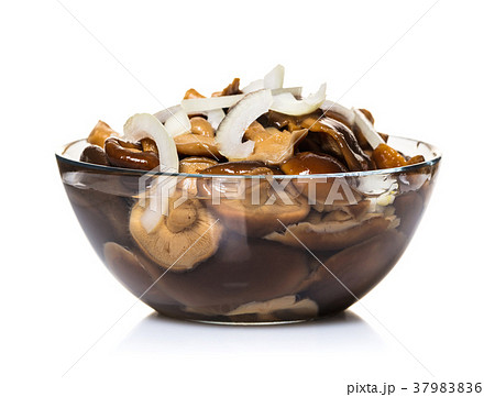Pickled mushrooms in a glass bowl Pickled mushrooms in a glass bowl 37983836