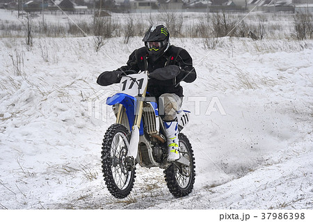 Sportsman racer man fulfills a fast ride Sportsman racer man fulfills a fast ride 37986398