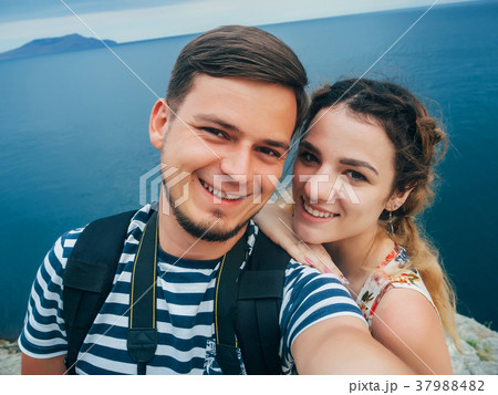 happy smiling couple travelers taking a selfie on happy smiling couple travelers taking a selfie on 37988482
