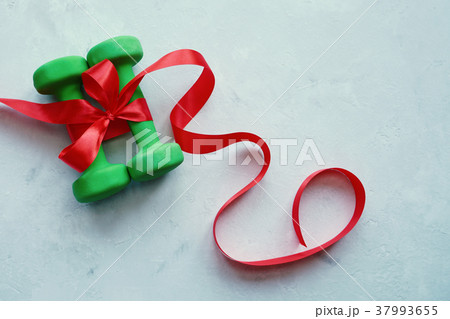 Dumbbells are a great gift for the new year. Dumbbells are a great gift for the new year. 37993655
