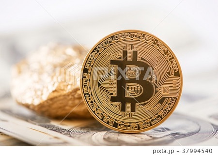 Main cryptocurrency golden bitcoin and gold lump 37994540