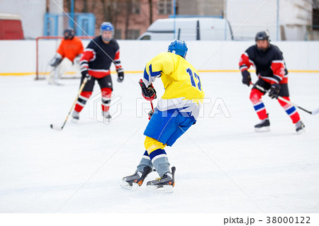 Ice hockey game on rink Ice hockey game on rink 38000122