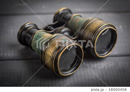 Old binoculars covered with patina. 38000408