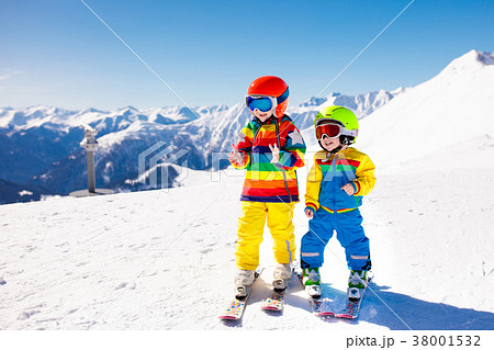 Ski and snow winter fun for kids. Children skiing. Ski and snow winter fun for kids. Children skiing. 38001532
