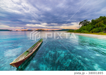 Tropical beach, caribbean sea, canoe floating 38001895