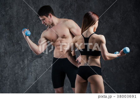 athletic beautiful sexy young couple posing in 38003691