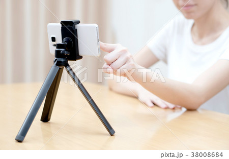 Young woman recording content for her blog Young woman recording content for her blog 38008684