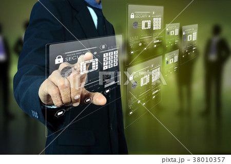 Businessman pressing virtual buttons Businessman pressing virtual buttons 38010357