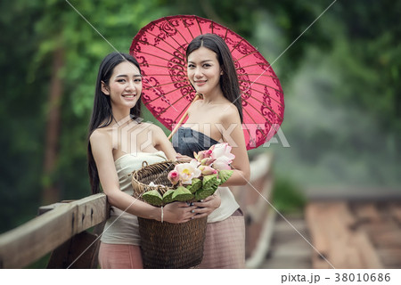 Fashion portrait of young beautiful girl in forest, Women with p Fashion portrait of young beautiful girl in forest, Women with p 38010686