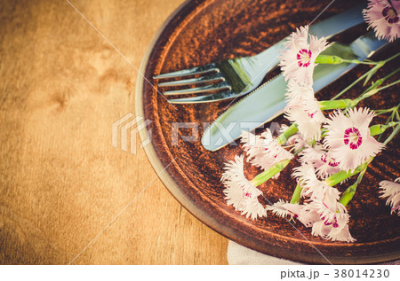 Festive table setting with flowers. Festive table setting with flowers. 38014230