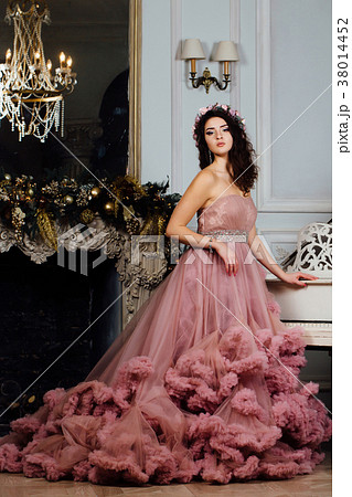 Beautiful sexy brunette in cloud dress posing in a 38014452