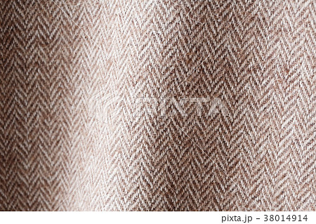 ヘリンボーンのこげ茶ツイード生地　背景 38014914