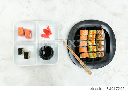 Black and white plate with various rolls Black and white plate with various rolls 38017205