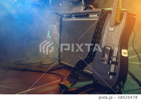Guitar and combo on stage. Guitar and combo on stage. 38020478