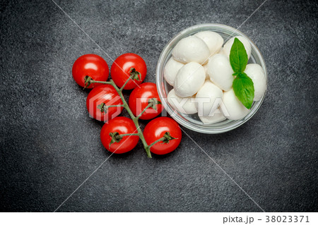 Italian mozzarella cheese and tomatos. Caprese Italian mozzarella cheese and tomatos. Caprese 38023371