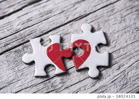 puzzle pieces which form a heart puzzle pieces which form a heart 38024335
