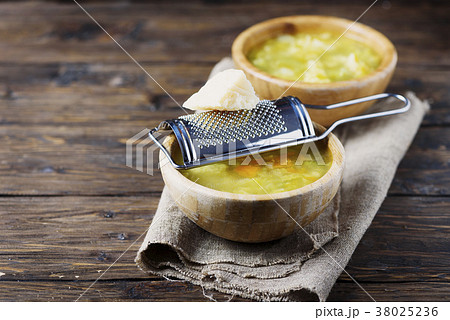 Vegetable vegetarian soup with parmesan cheese 38025236