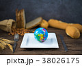 World globe on white  plate, knife, fork on table 38026175