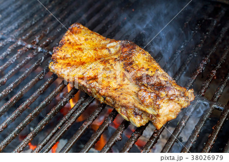Pork Ribs on the Grilling barbecue meat  38026979